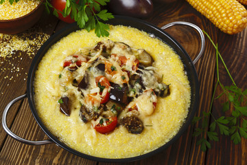 Polenta baked with vegetables and cheese