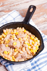 Meat stew with beans and corn