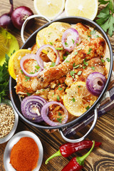 Spicy chicken in a ceramic pot