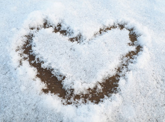Heart-shape drawing on the snow