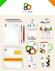 Abstract green orange blue logo and corporate identity template realistic set of cups, business card, letterhead, envelope, drive, usb memory sticks and pen. Vector illustration