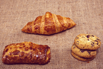Freshly baked butter croissant. Studio photo.