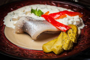 Tasty herring in cream sauce.