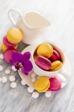 Several types of macaroons with white cup