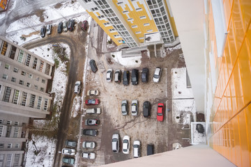 Parking car near the apartment building in winter