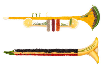 The brass of diet / Healthy food concept of a musical wind instrument clarion, trumpet or horn, made of vegetable mix, isolated on white.