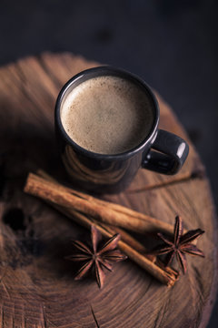 Fototapeta Delicious cup of coffee with cinnamon