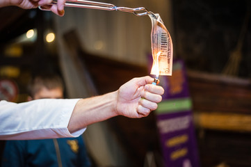 Chemistry experiment with bill on fire