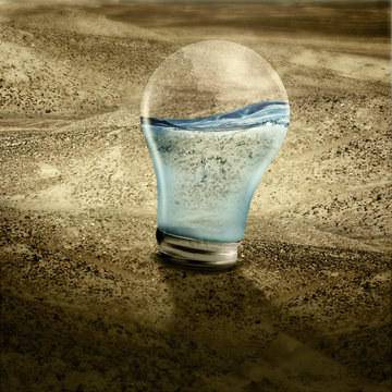 
Water in light bulb on dried land
