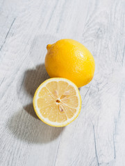 Slice lemon on wooden background