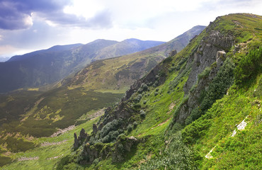 Fototapeta na wymiar Green mountain ridge panorama, summer sunny day.