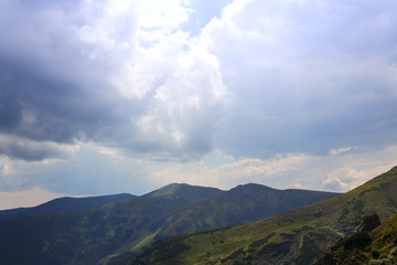 Fototapeta premium Dramatic sky with rain-clouds in Carpathians.