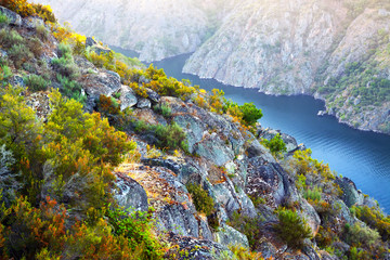 river with high rocky banks