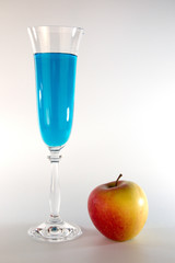 Glass with blue liquid