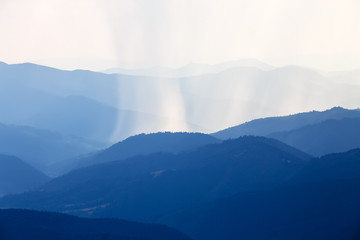 Summer rain in mountains.