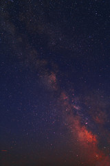 Vibrant night sky, milky way in mountains.