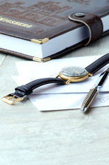 The clothbound notebook, stationery, watches