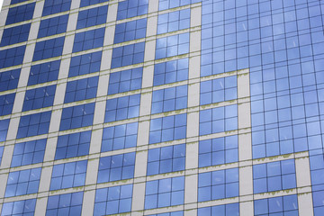 Blue background from office glass windows
