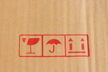 caution protection symbol label on paper box.