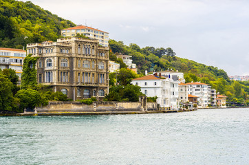 Fototapeta na wymiar view of facades of old houses on waterfront