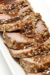 Pork tenderloin with teriyaki sauce and sesame