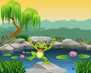 Fototapeta premium Cartoon happy frog jumping on the rock
