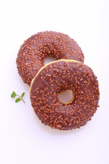 donuts with chocolate icing on a white background