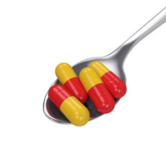 pills capsule on spoon