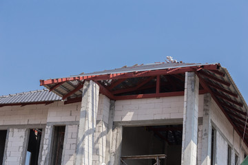 structural steel beam on roof of building residential constructi