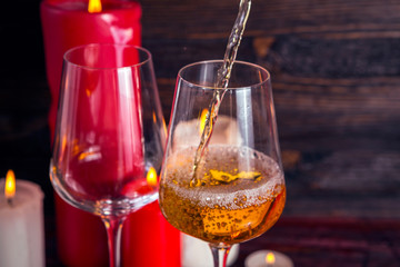 Two glasses of  wine and candles