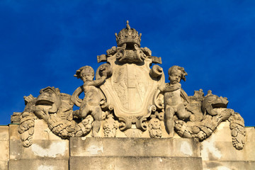 Fototapeta na wymiar Fragment of architectural ornation in baroque style.