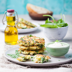 Cabbage and spinach pancakes with yogurt dressing with fresh herbs