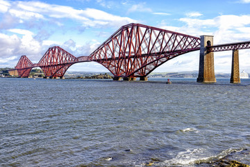 View of Forth Bridge, Scotland, UK. Fort Bridge is a cantilever railway bridge considered an iconic structure and a symbol of Scotland. It is a UNESCO World Heritage Site.