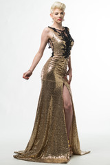 Fototapeta premium Woman Beauty Long Fashion Dress, Elegant Girl In Gold Gown