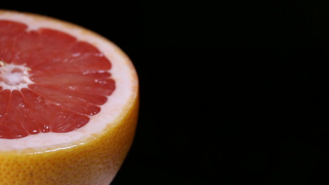 Halved healthy grapefruit. Macro shot.