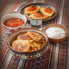 Red caviar and thick potato pancakes at Shrovetide (mass produce