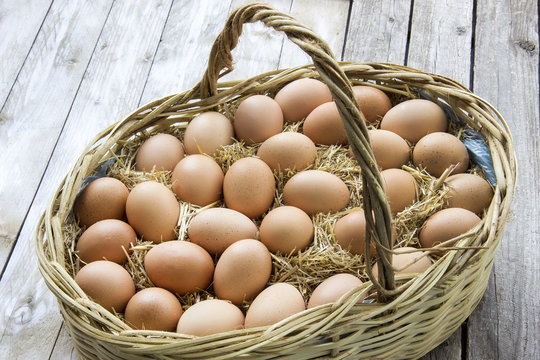 Egg basket on the wooden table