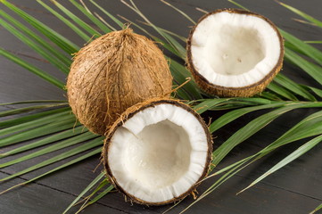 Fototapeta na wymiar Fresh coconuts and coconut leaves
