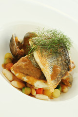 sea bass fish with beans plated meal