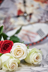 a bouquet of white end red roses, blank for cards