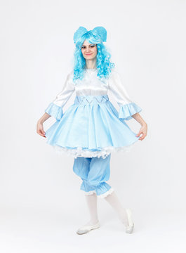 Theatre actress in fairy tale costume on white background