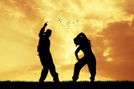 couple dancing hip hop at sunset