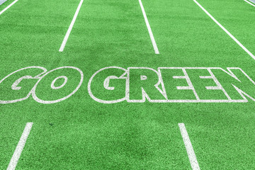 Go Green written on running track