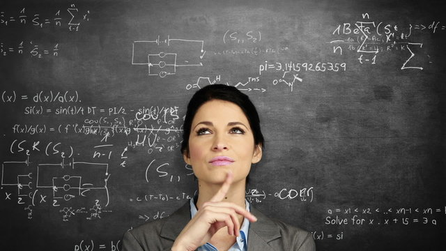 Thoughtful businesswoman looking up