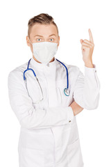 Young  male doctor in white coat and stethoscope finger point up