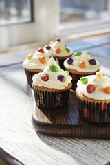 Creamy cupcakes with color drops