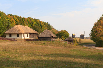 Old houses of the peasants and mill. Pirogovo, Ukraine