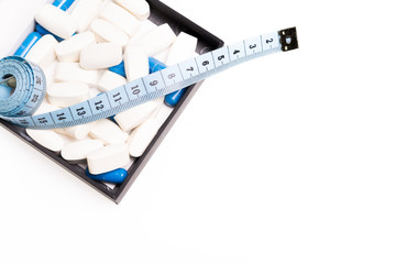 Medical pills and centimeter, for weight loss or increase penis size