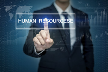 Businessman hand touching HUMAN RESOURCESE  button on virtual sc