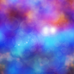 Abstract pink, blue and orange background resembling clouds with sunglight and bokeh effect